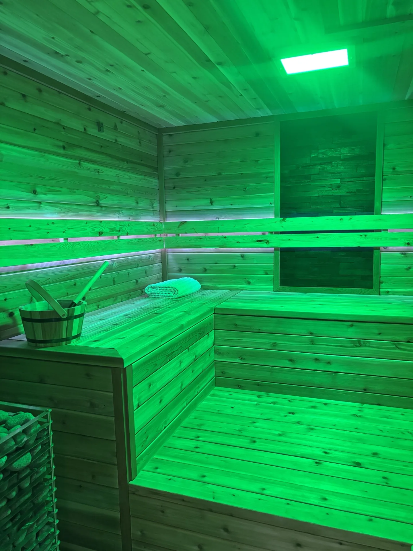 Sauna interior with green chromotherapy lighting